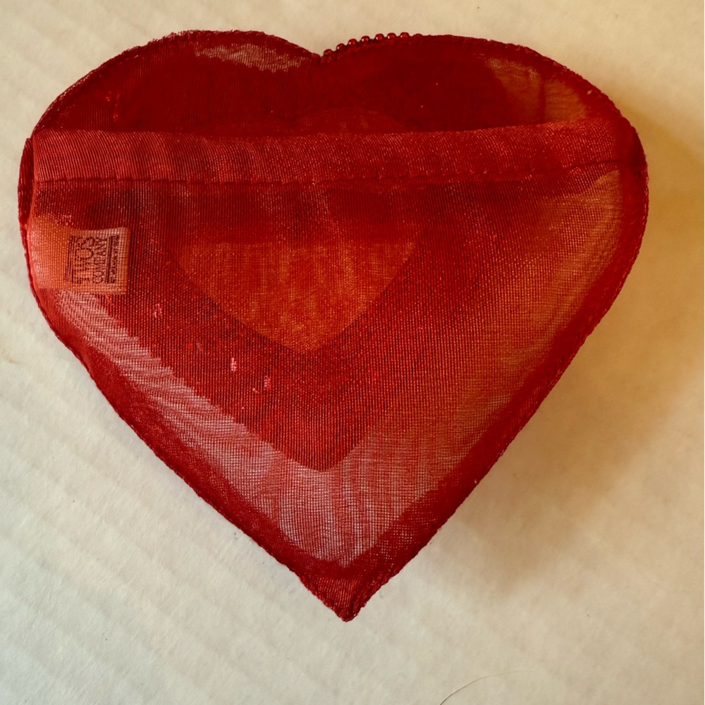 Bejeweled heart mirror